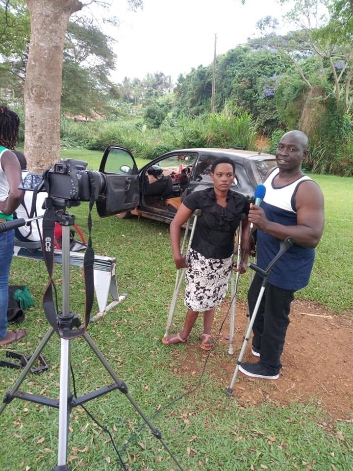 An athlete is interviewed on camera, with crutches visible nearby.