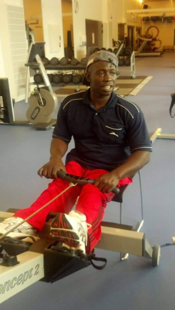 An athlete trains on an indoor rowing ergometer.