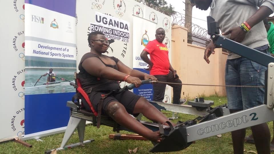 An athlete trains on an ergometer during a federation event.